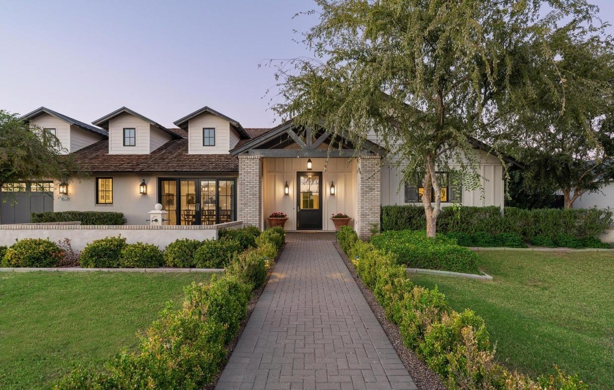 Front yard landscaping with rocks and mulch